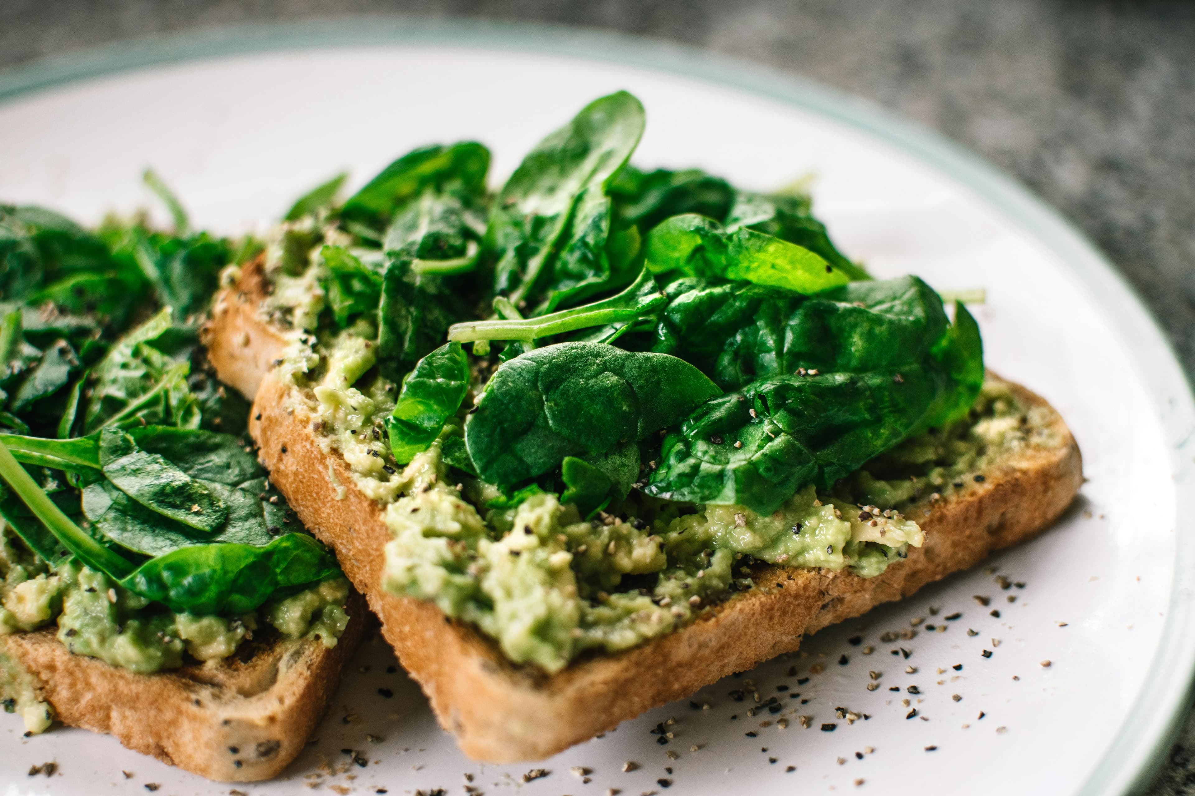 Avocado toast with eggs and fruit - balanced breakfast