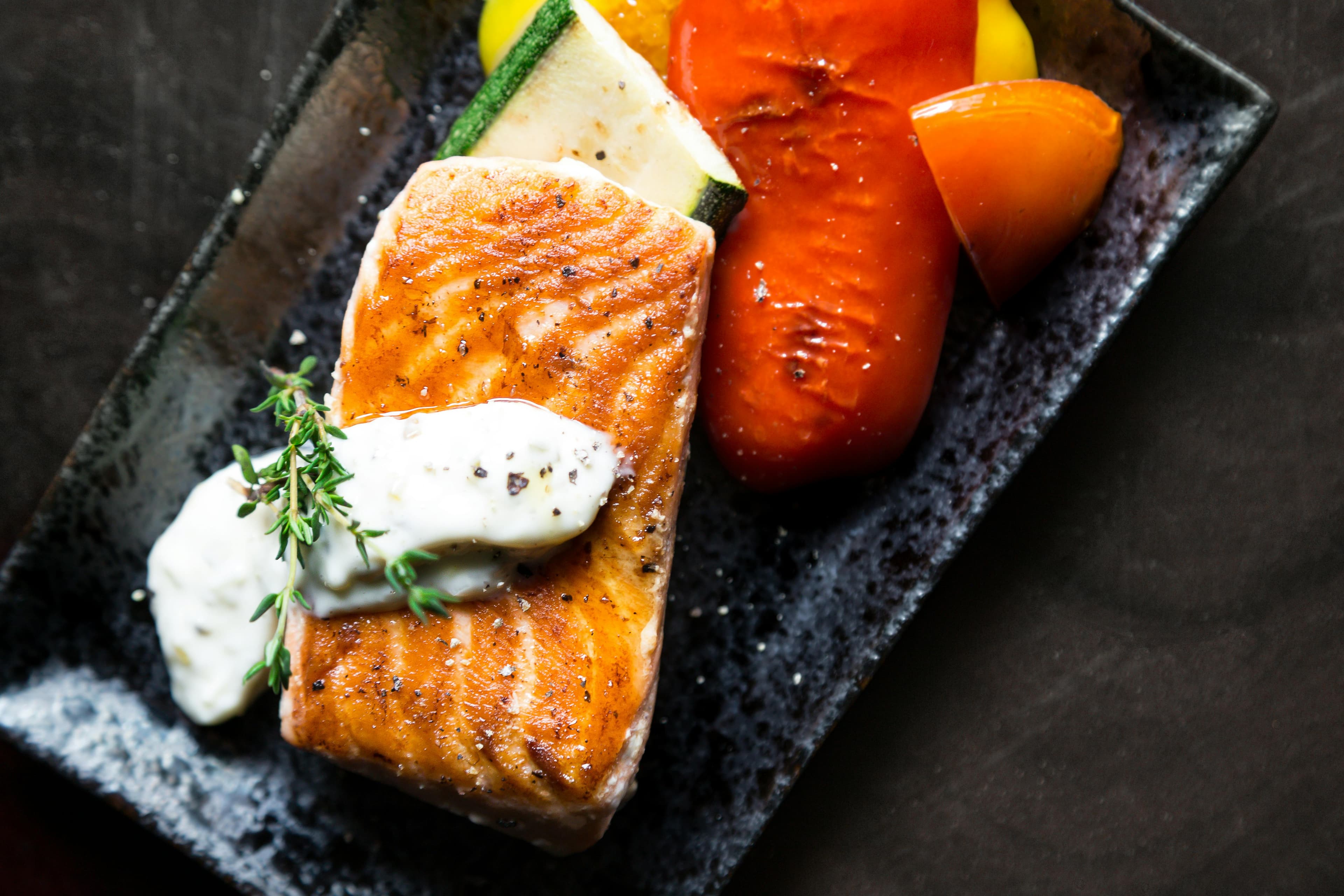 Salmon stir-fry with vegetables and rice - balanced dinner